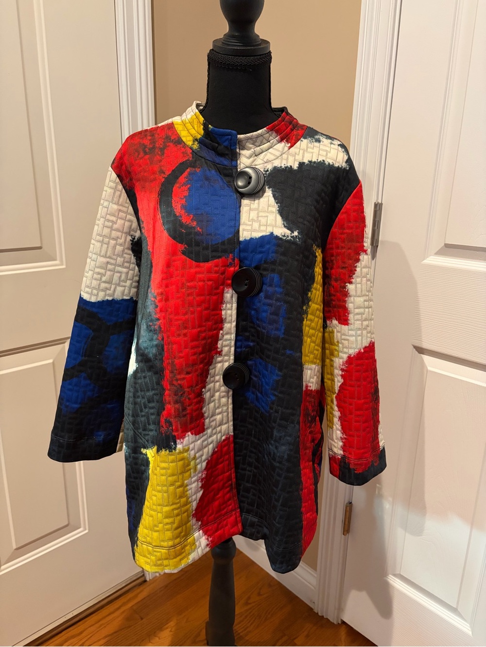 Multiples graphic abstract art-to-wear jacket.